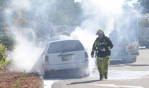 The driver of this Holden Commodore jumped from the burning car in the centre of Coffs Harbour yesterday. The driver of this Holden Commodore jumped from the burning car in the centre of Coffs Harbour yesterday.